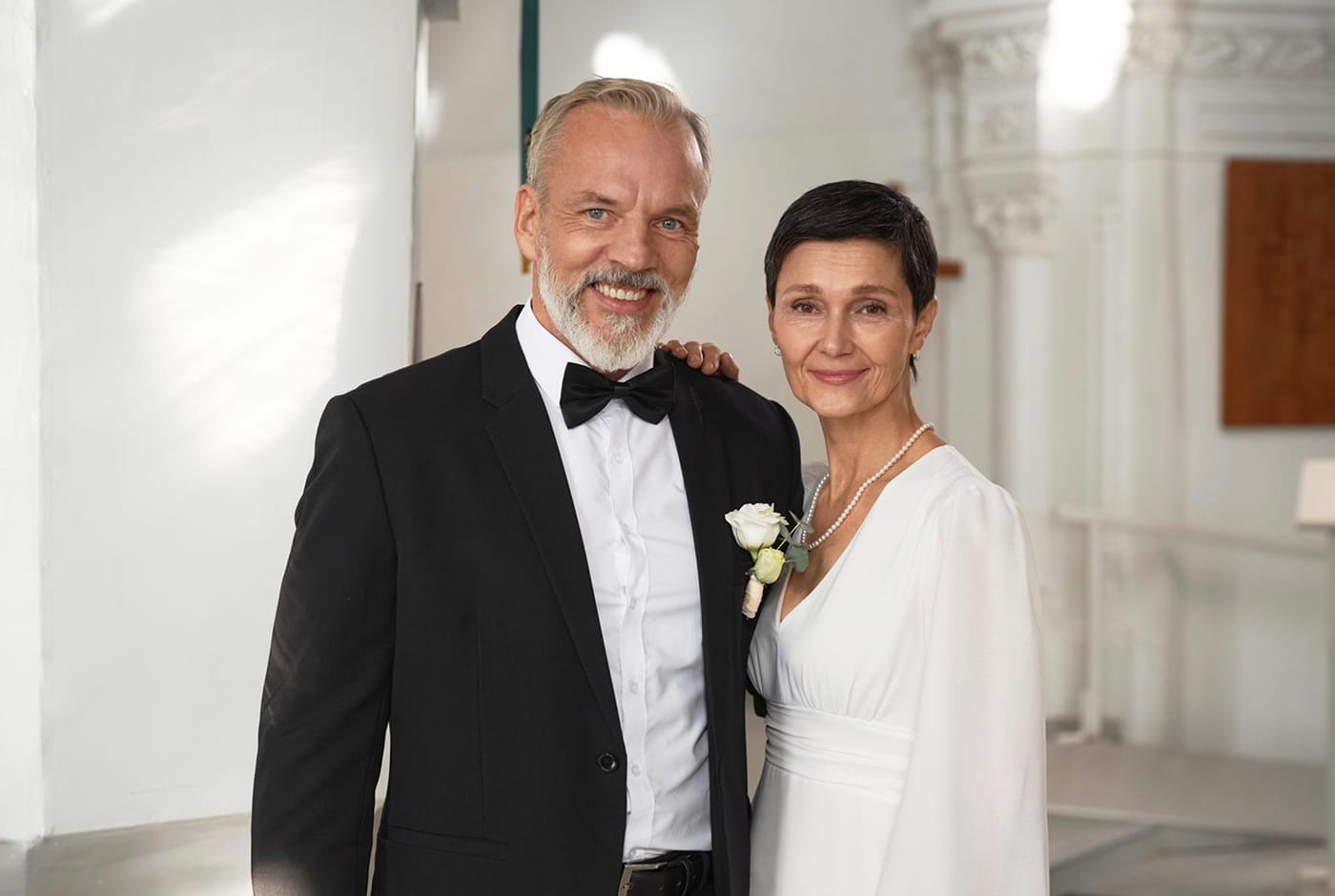 Mature couple smiling together at their wedding